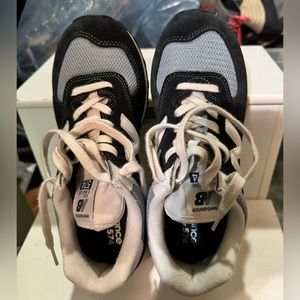 New Balance MEN’S Classic 574’s size 7 in navy and light blue